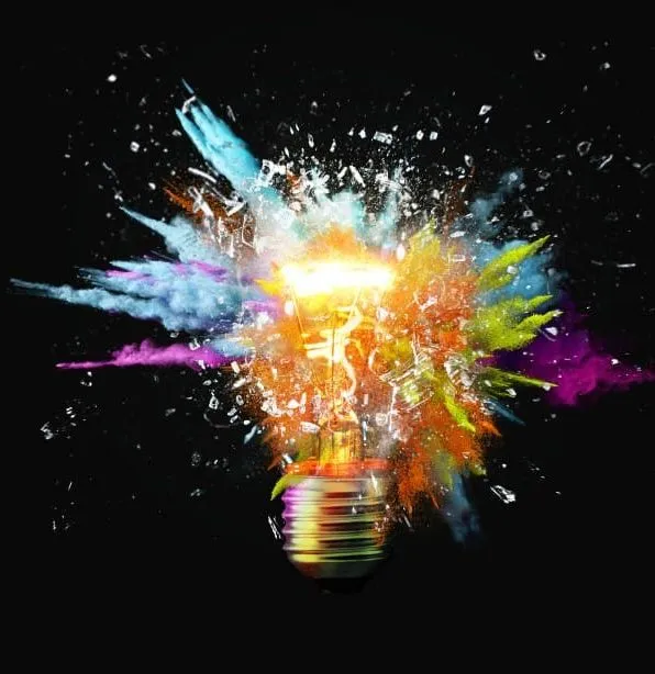 Shattering light bulb with colorful powder explosion