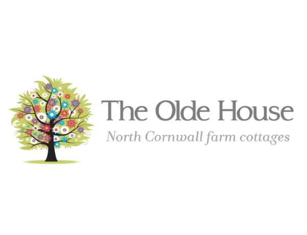 The Olde House North Cornwall farm cottages logo with a colorful tree