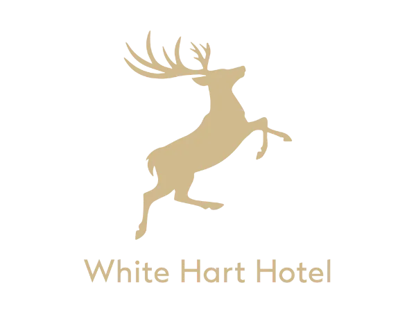White Hart Hotel logo featuring a leaping stag above the hotel name