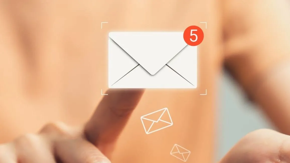 Person tapping on a virtual email icon with a notification badge