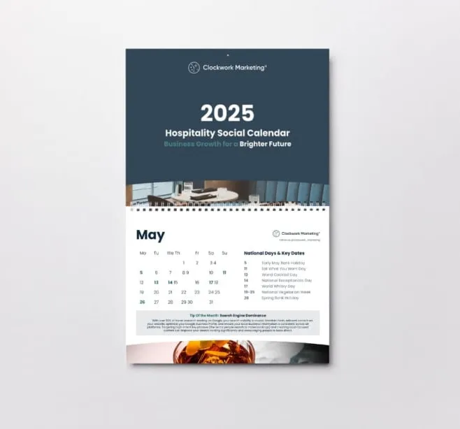 2025 Hospitality Social Calendar by Clockwork Marketing displayed on a white surface, showing the month of May with key dates and marketing tips.
