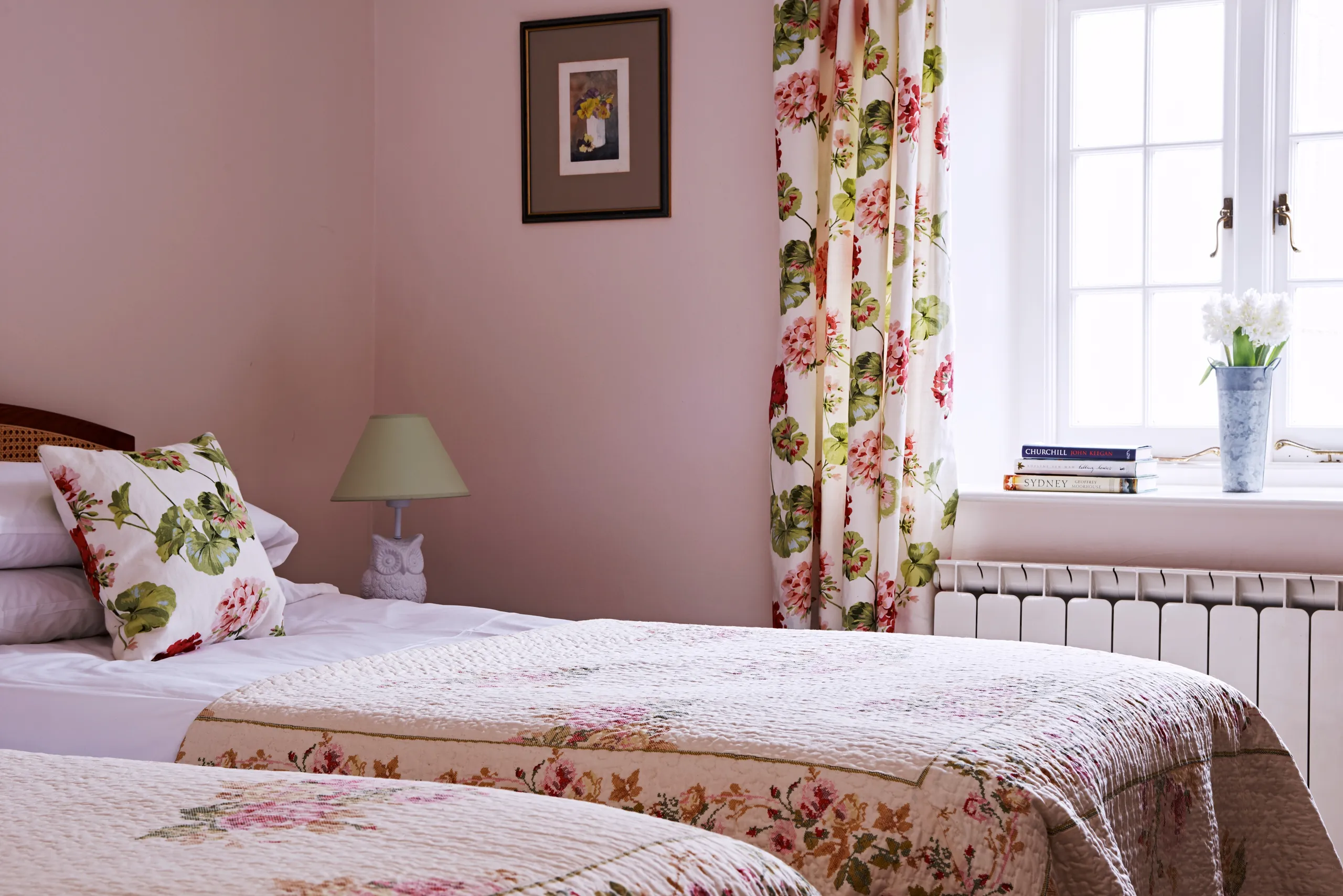Pink twin bedded room