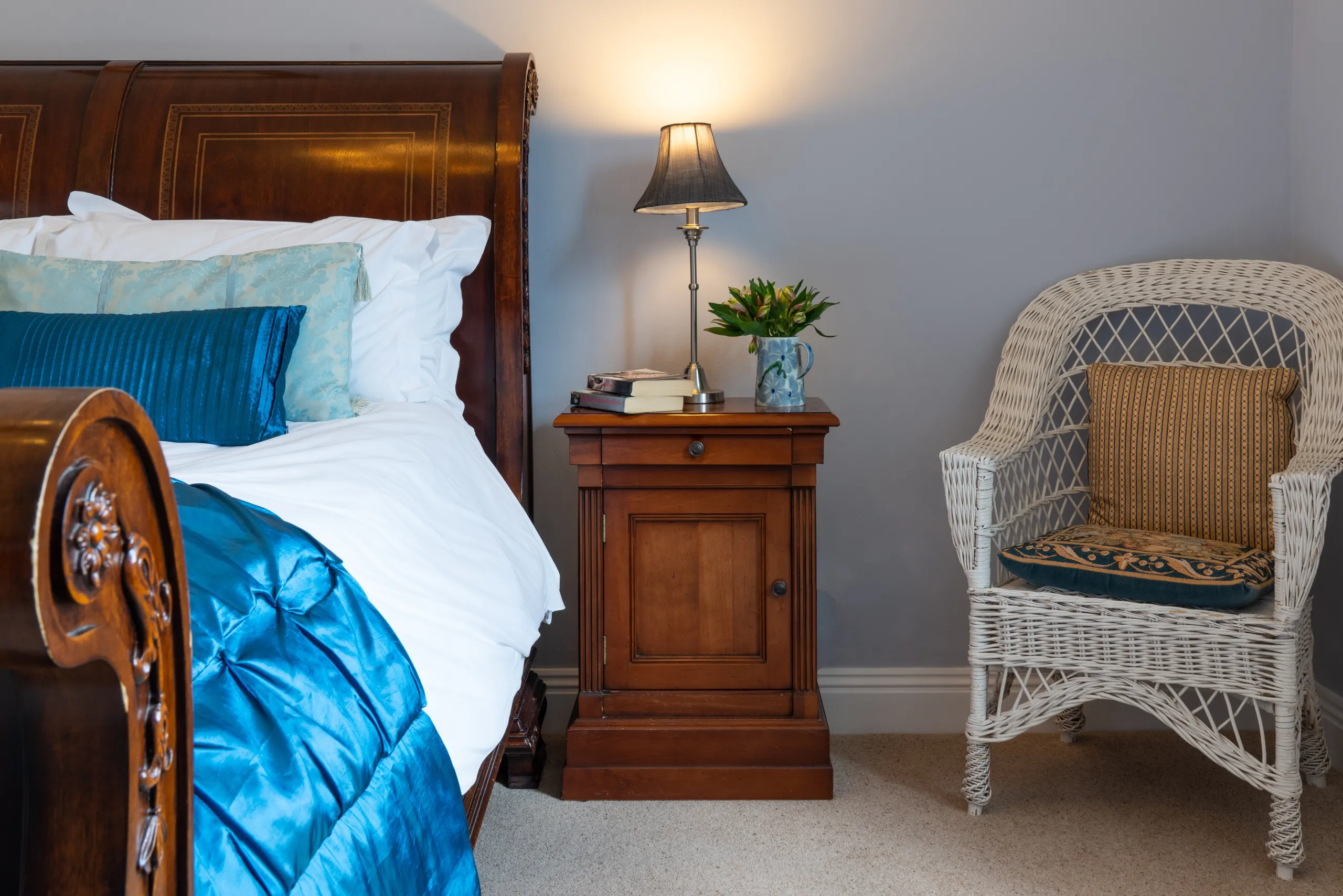 Traditional double bed with blue cover