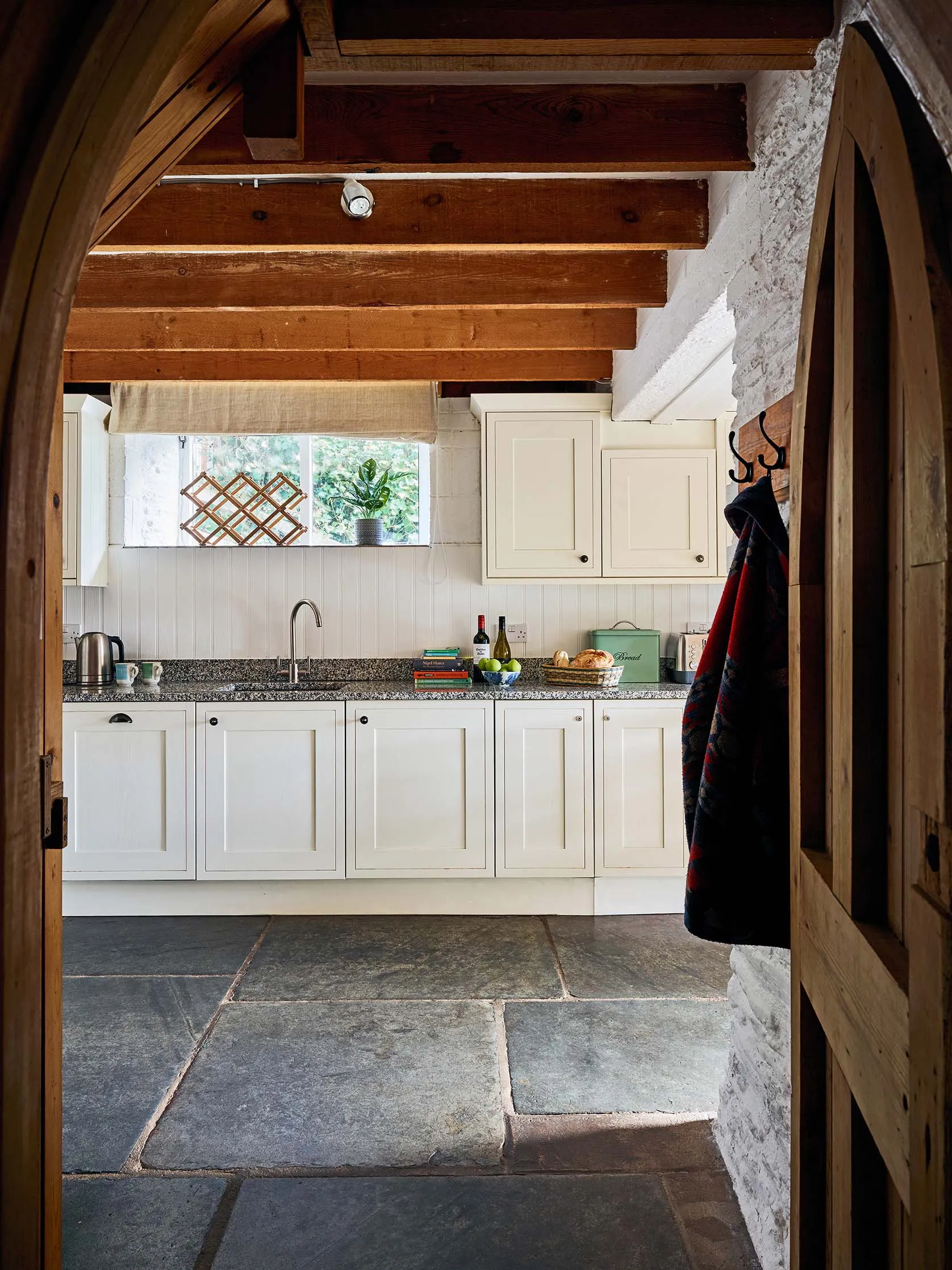 Quarry kitchen through door p[ortrait
