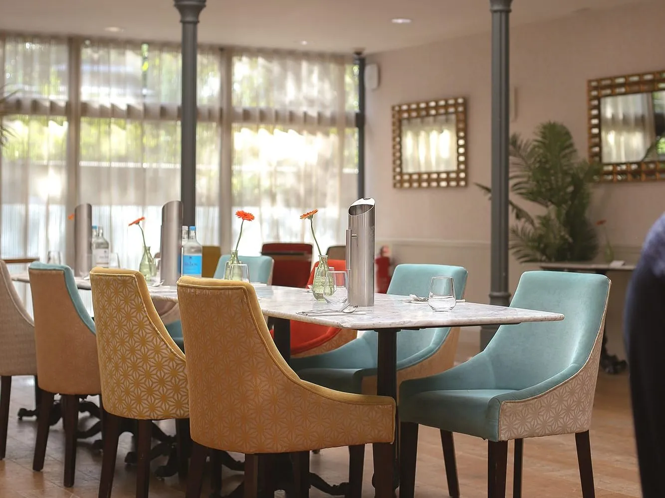 Dining table set up in centre of room