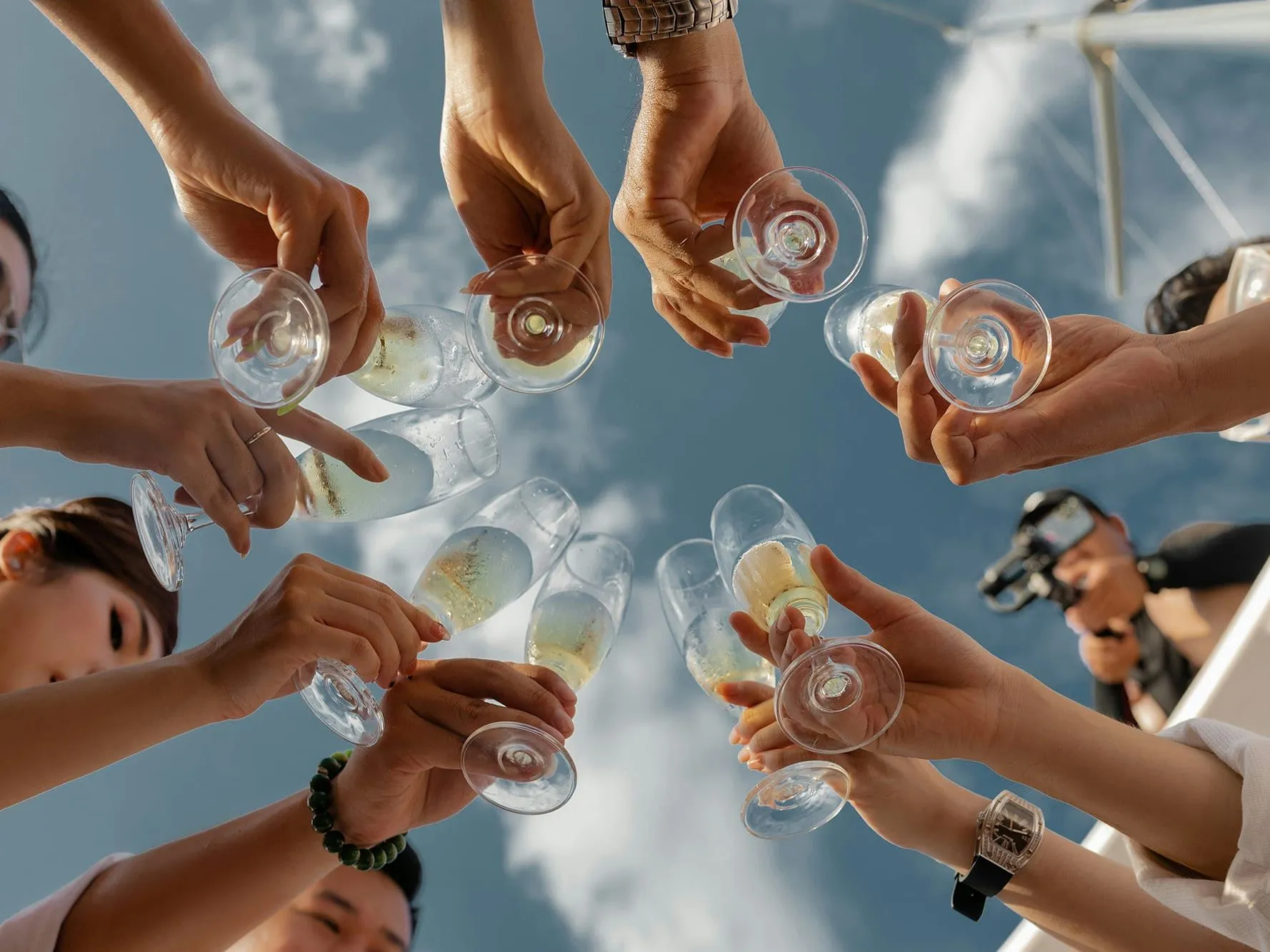 People raising glasses of champagne