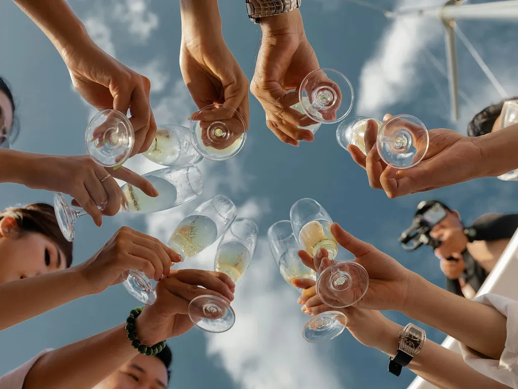 People raising glasses of champagne