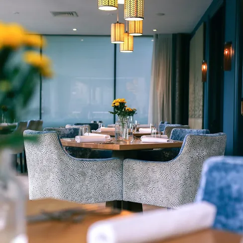 Tables set up in restaurant