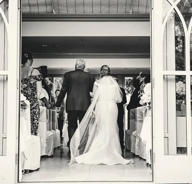 A bride walking down the aisle.