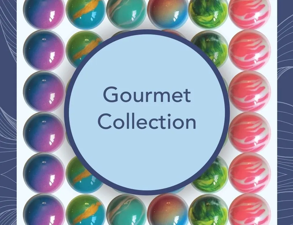 Assorted gourmet bon bons arranged around a central circle labelled Gourmet Collection, featuring glossy marbled and gradient finishes in pink, blue, green and gold.