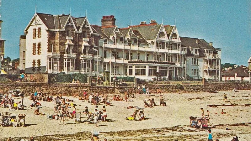 Vintage seaside photograph of Ommaroo hotel and beach with holidaymakers on the sand