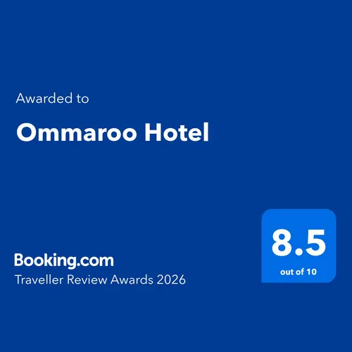 Booking.com Traveller Review Awards 2026 graphic awarding Ommaroo Hotel a score of 8.5 out of 10.