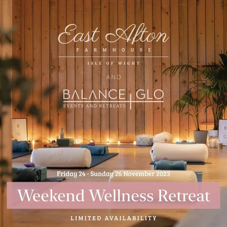 Weekend wellness retreat promotional image with yoga mats and bolsters in a cosy studio at East Afton Farmhouse, Isle of Wight