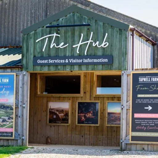 Entrance to The Hub guest services and visitor information building at Tapnell Farm