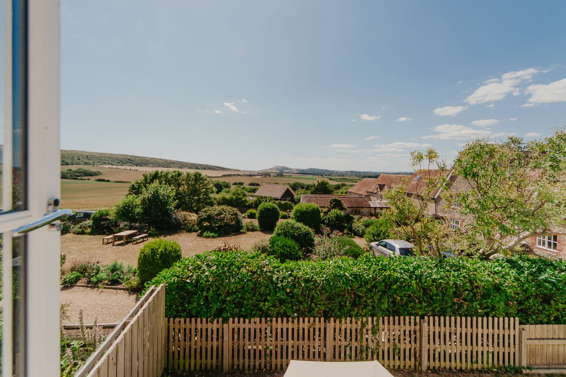 View over the garden and countryside from Dairyman's Cottage at Tapnell Farm