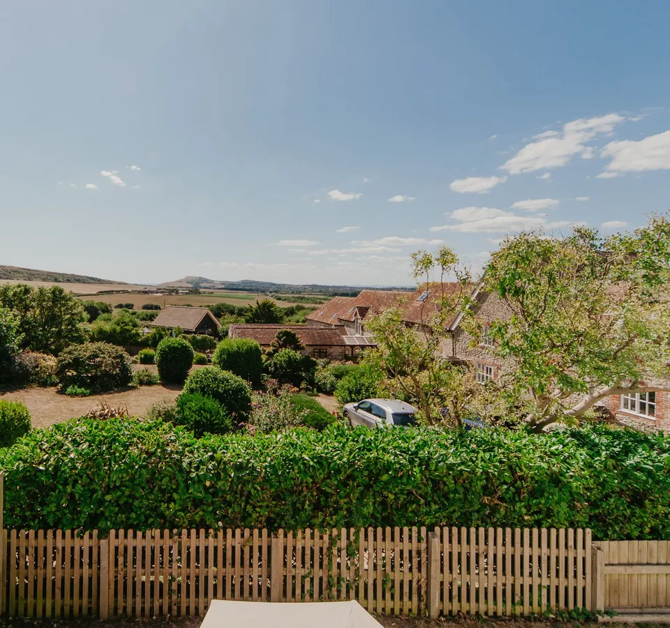 View over the garden and countryside from Dairyman's Cottage at Tapnell Farm
