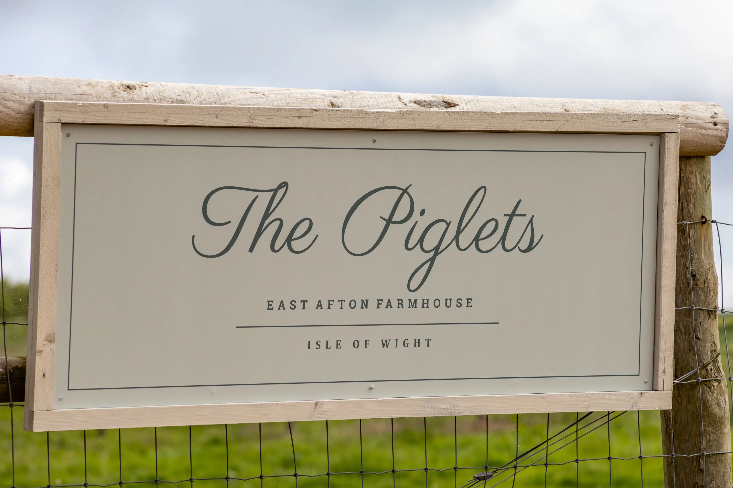 Wood-framed sign reading 