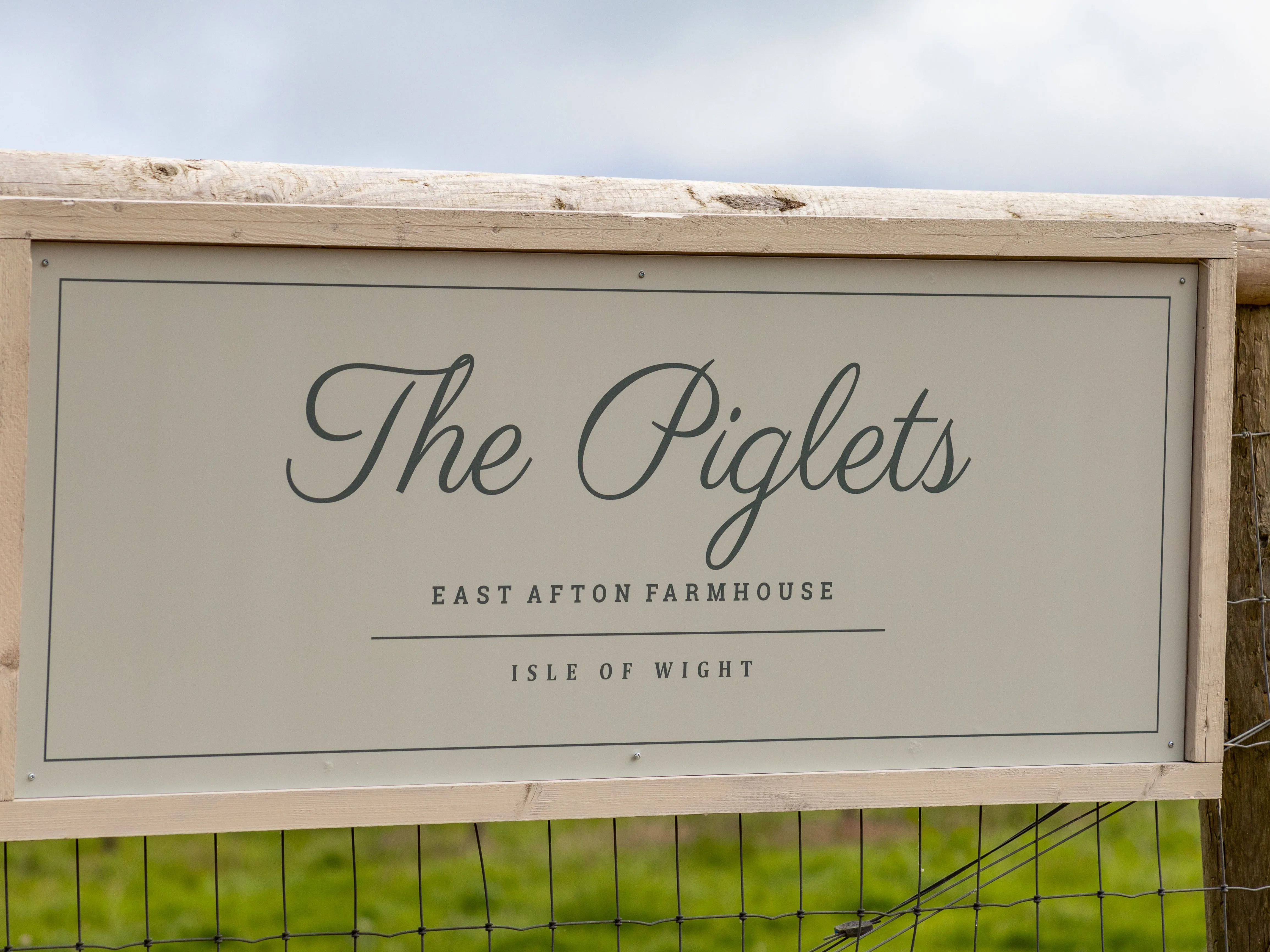 Wood-framed sign reading 