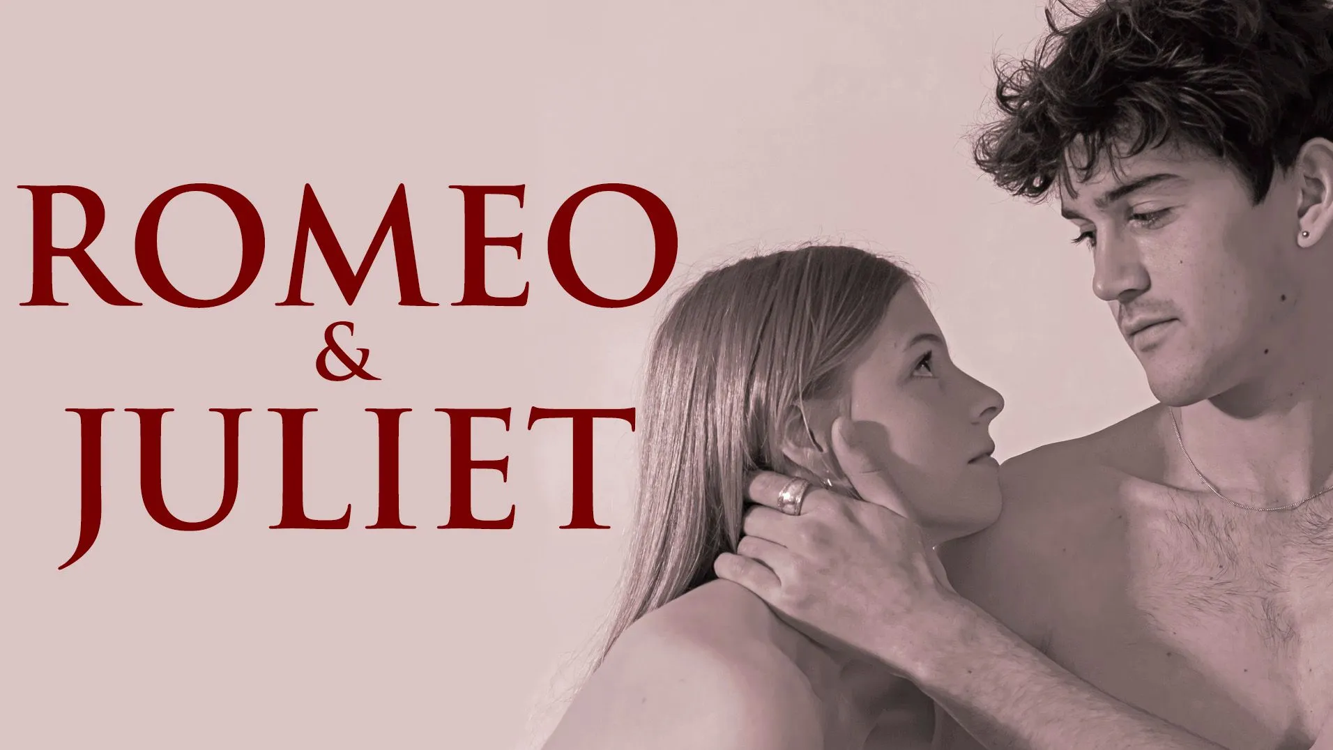 Romeo and Juliet text with a man and woman gazing at each other intimately