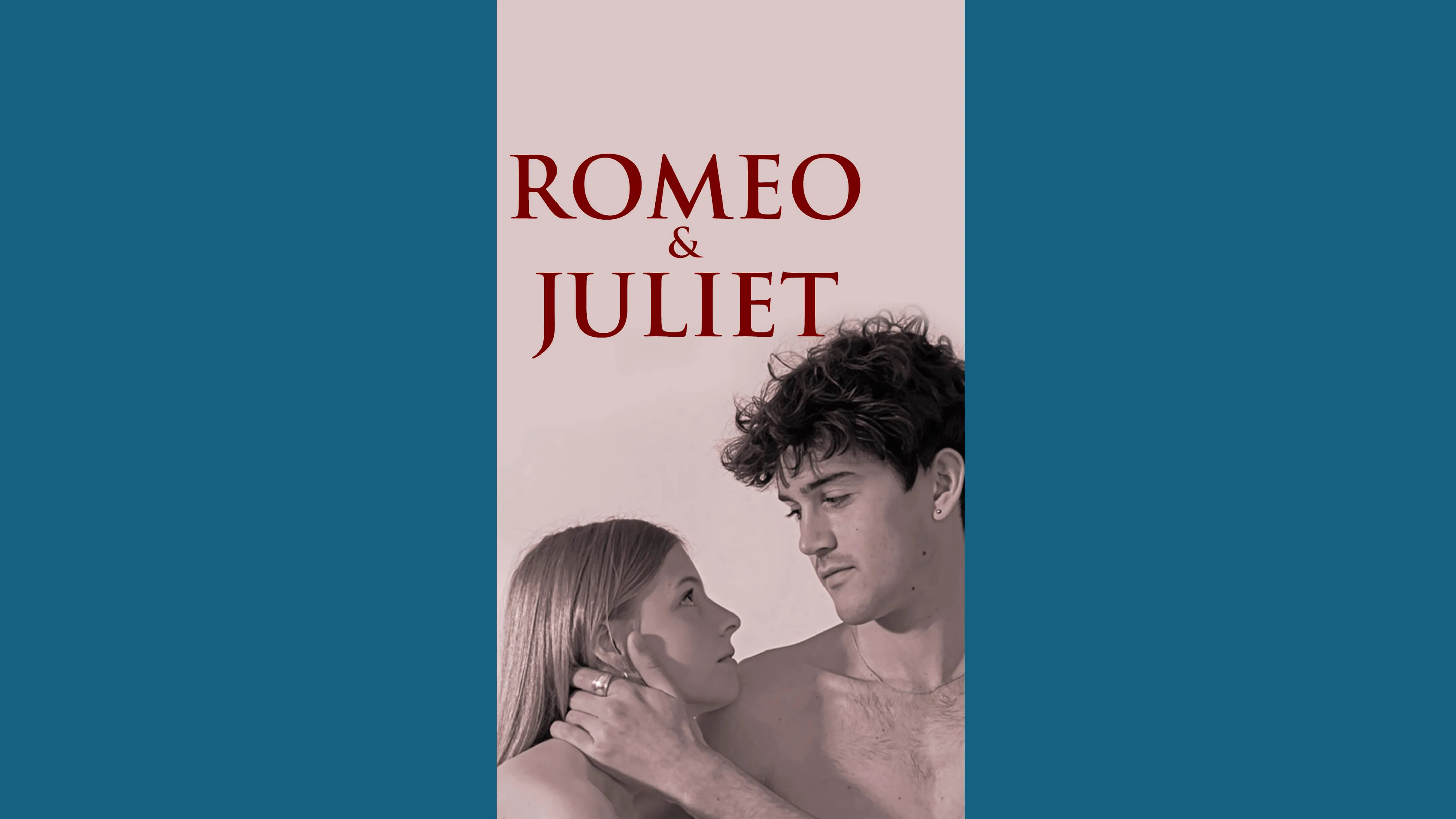 Poster for Romeo & Juliet featuring a man and a woman looking at each other closely.