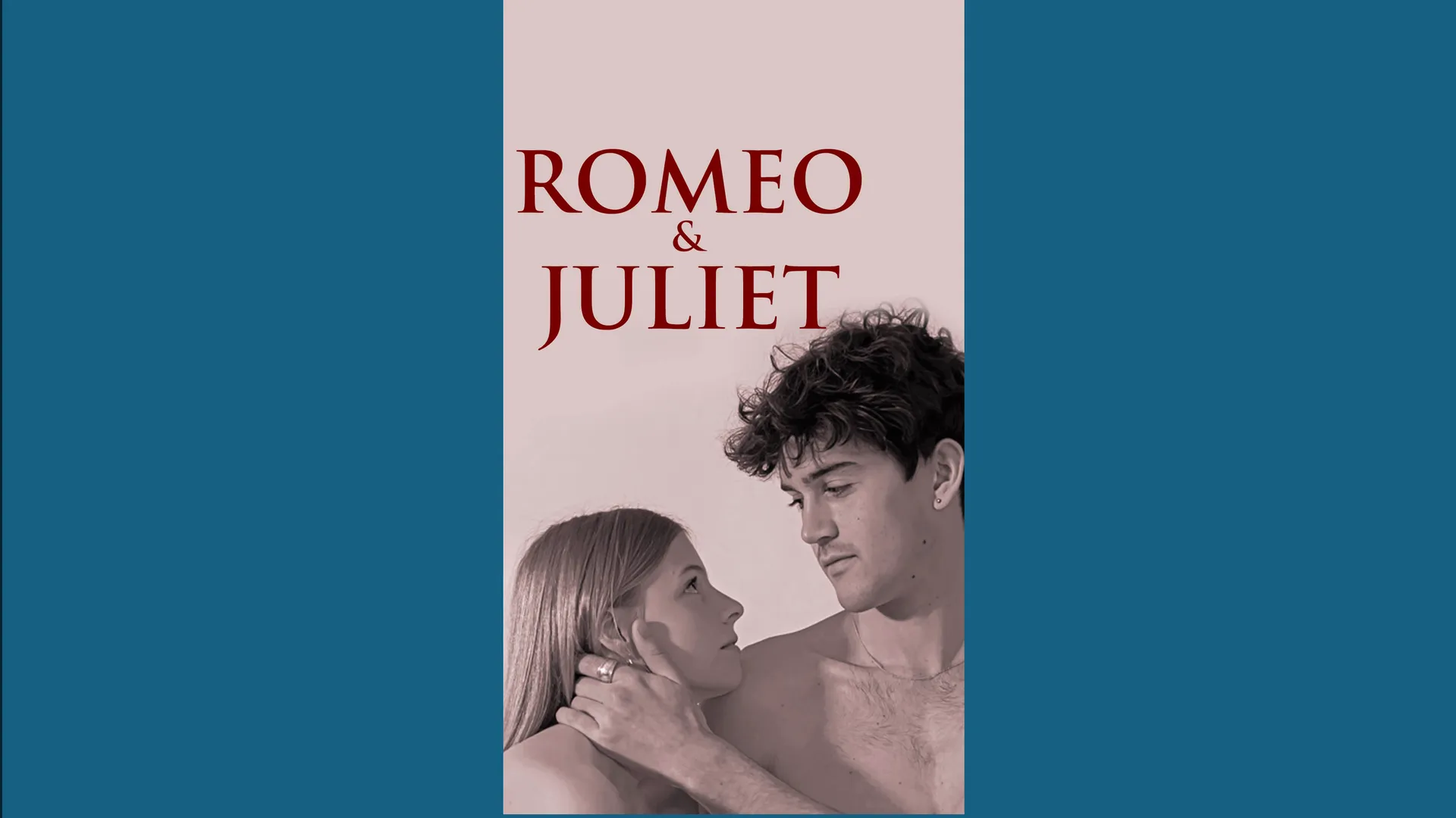 Poster for Romeo & Juliet featuring a man and a woman looking at each other closely.