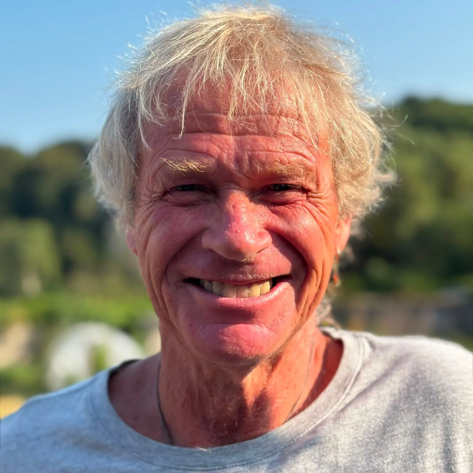 Portrait of Abram Peter Hircock smiling outdoors in warm sunlight