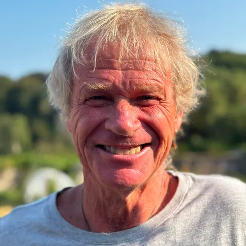 Portrait of Abram Peter Hircock smiling outdoors in warm sunlight
